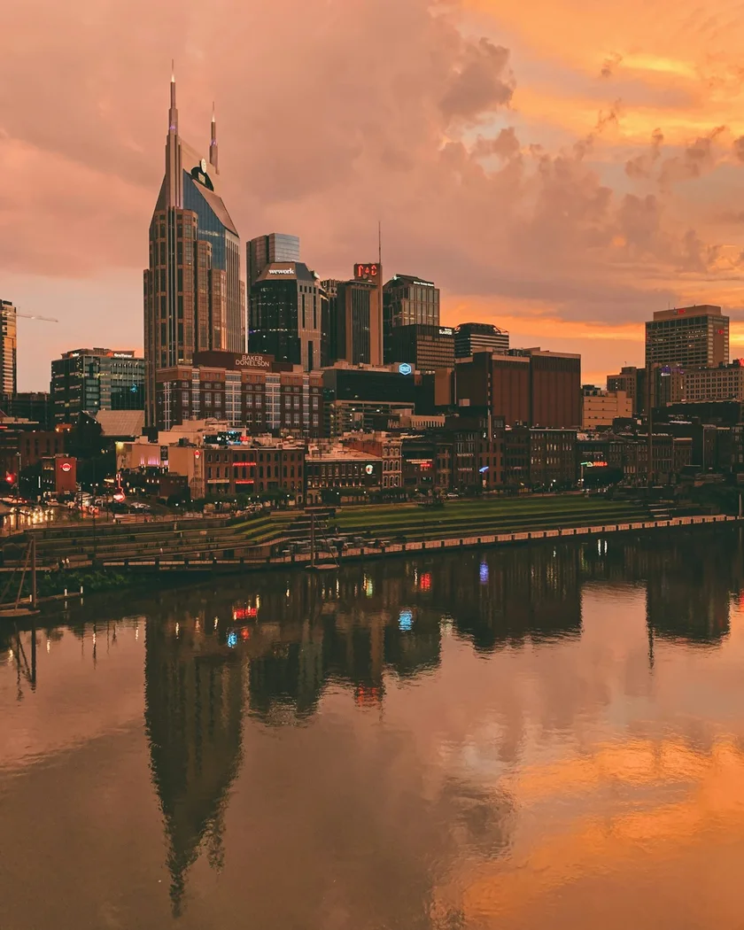 Downtown Nashville skyline over the Cumberland River at golden hour